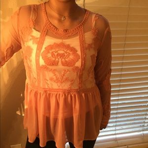 Orange lace and mesh top